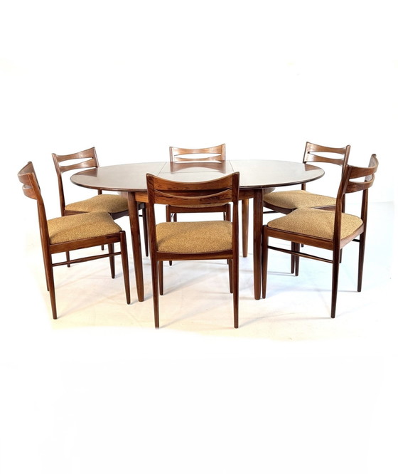 Image 1 of Vintage Rosewood extendable dining table '60