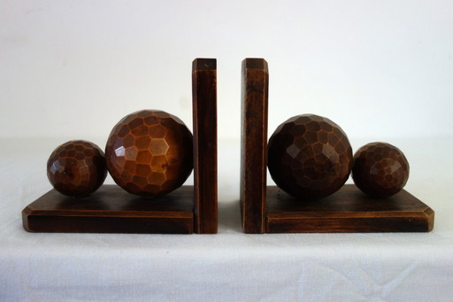 Pair of vintage wooden bookends with faceted balls