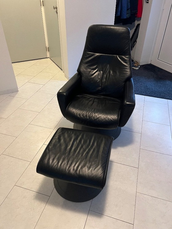 Image 1 of Leather recliner with footrest