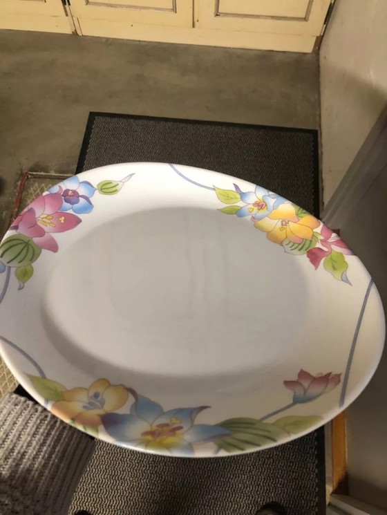 Image 1 of 15 plates with multicolored floral designs