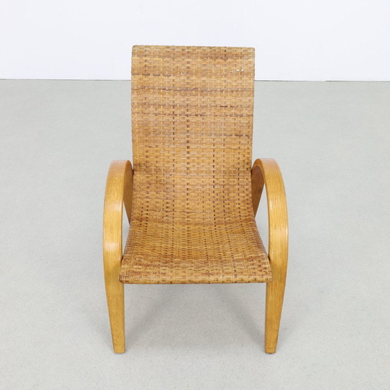 Image 1 of Rare fauteuil vintage en bois et canne, 1960S