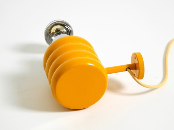 Image 1 of Very rare original 1960s Space Age "Bulb" wall lamp by Ingo Maurer in yellow with a clear glass shade