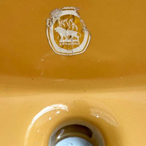 Image 1 of Vintage mosterdkleurige ronde spoelbak van Keramag Keravit, jaren 80.