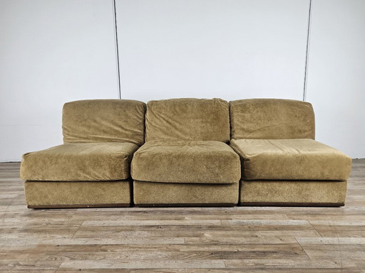 Tres sillones de tela de los años 70