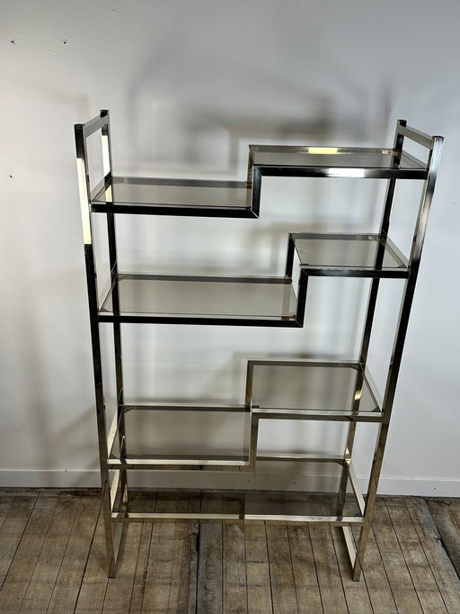 Vintage 1970 bookshelf by Romeo REGA (ITALY) in silver and gold chromed metal. 4 offset shelves with smoked glass.