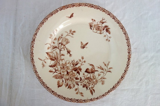 Image 1 of 11 assiettes plates Terre De Fer Gien modèle Mai vers 1900