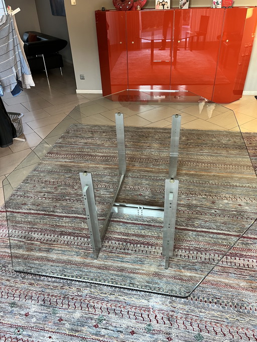 Glass dining table 8-cornered on stainless steel base