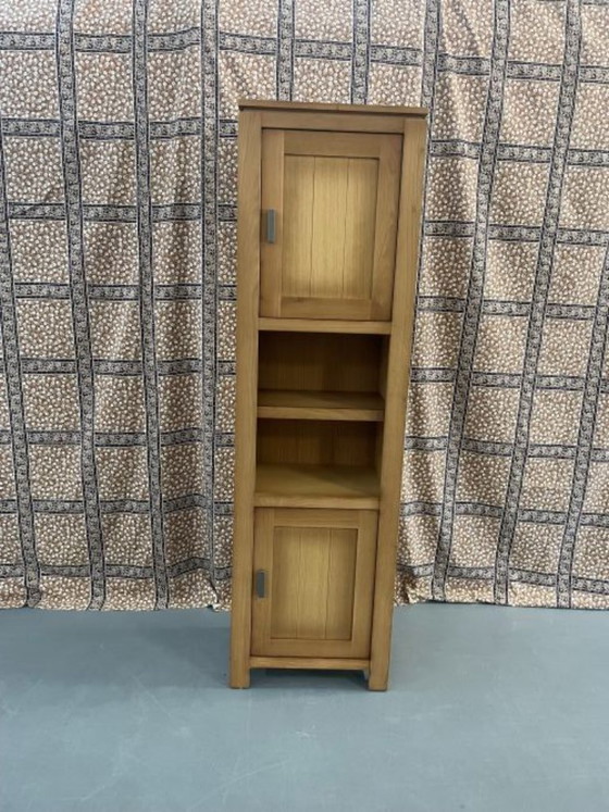 Image 1 of Smalle hoge lichteiken kast