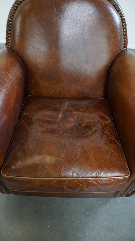 Image 1 of Rundleren design fauteuil/ armchair met ronde vormen en siernagels