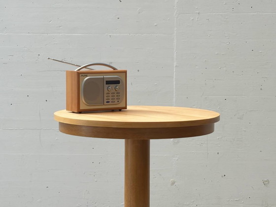 Image 1 of Ronde bijzettafel met gietijzeren voet, jaren 70