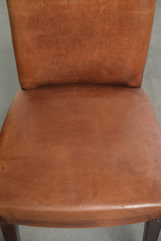 6x Begeerlijke schapenleren eetkamerstoel in een mooie cognac kleur met een mooi patina – Eetkamerstoelen (photo 10 of 17)