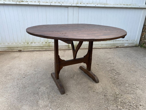 antique folding round winemaker's target table with tilting top