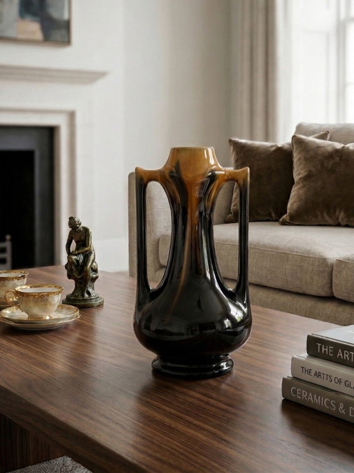 Art Deco vase in flamed brown-black glazed stoneware – openwork handles – French work – 1930s – 28 cm