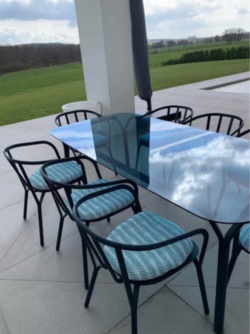 Roche Bobois aluminum glass table with 8 chairs and cushions