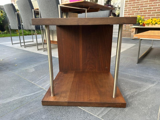 Image 1 of Bert Plantagie Hidden – opgeknapte design eetkamer- en salonset (noten + RVS)