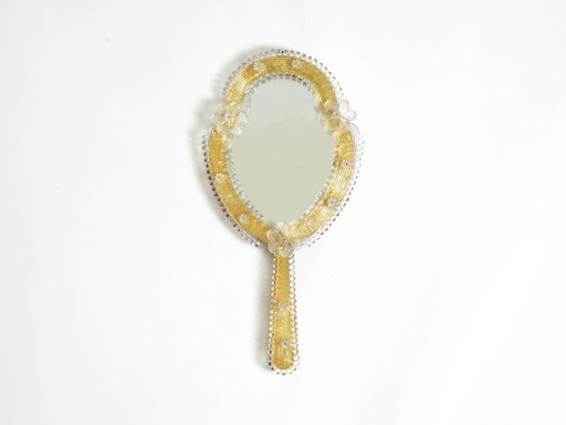 Beautiful Venetian Mid-Century Modern hand or wall mirror with Murano glass rosettes. Made in Italy.