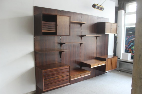 Mueble de pared en palisandro, de Poul Cadovius para Cado, Dinamarca. – Estanterías de pared, Wood (photo 6 of 17)