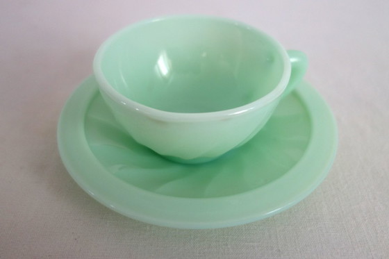 Image 1 of 10 almond green opaline cups and saucers from the 50s