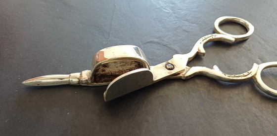 Image 1 of Apagavelas de plata