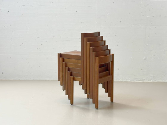Image 1 of Set van 6 stapelbare houten stoelen in een minimalistisch design uit het midden van de vorige eeuw.