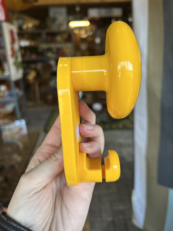 Image 1 of 3 vintage Italian design yellow coat hooks