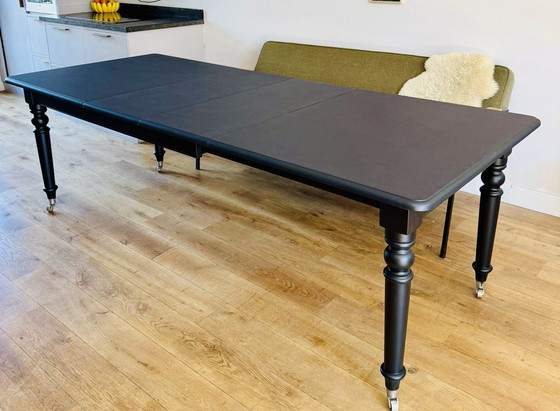 Image 1 of Eichholtz coulissen tafel (mat zwart)