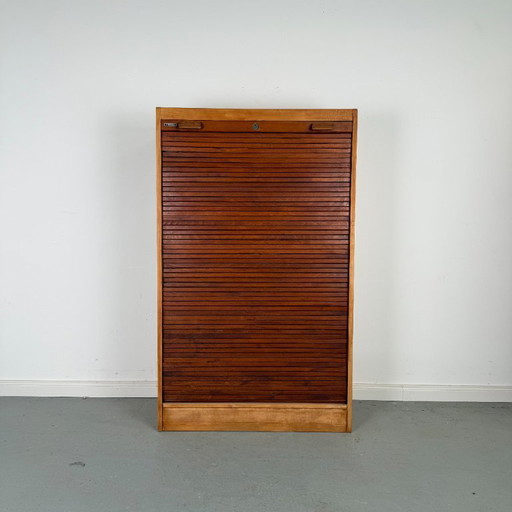 Compact roller shutter cabinet in Art Deco style