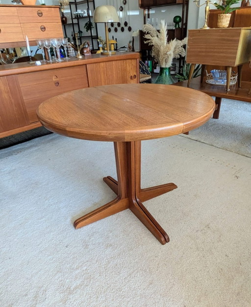Vintage teakhouten Deense uitschuifbare ronde eettafel