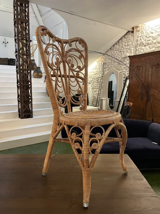 Image 1 of Een paar pauwenrotan stoelen