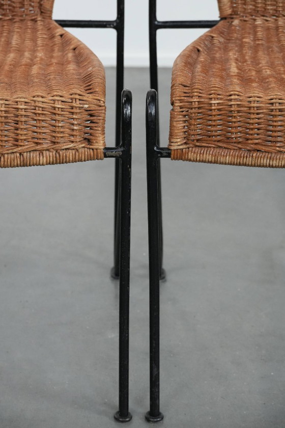 Image 1 of 2x Vintage design eetkamerstoelen van Frederick Weinberg met een gietijzeren frame