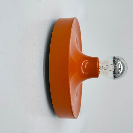 Image 1 of Mid-century design honsel oranje space age schijflamp , jaren 1970 toegeschreven aan Charlotte Perriand voor les arcs