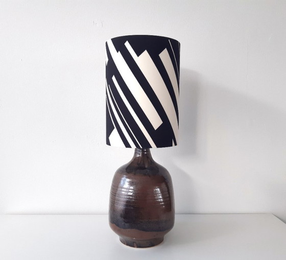 Image 1 of Sturdy dark brown ceramic Rheinfelden lamp base with new handmade lampshade of black and white graphic fabric