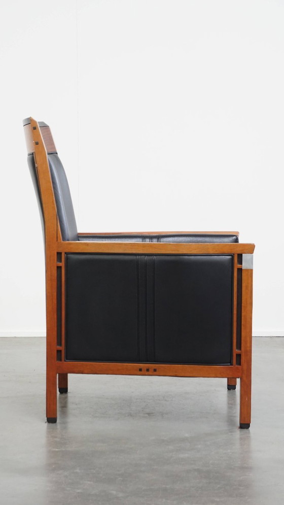 Image 1 of Black cowhide leather and wood Art Deco design armchair by Schuitema from the decoforma series
