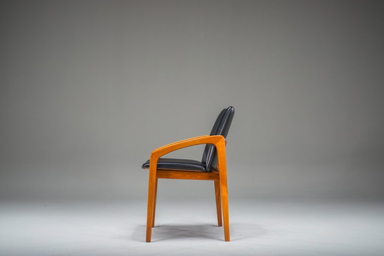 Image 1 of  Mid Century Eetkamerstoel Model 23 van Henning Kjærnulf voor Korup Stolefabrik, jaren 1960