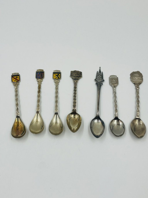 Set mit 7 heraldischen Stadt-Souvenir-Löffeln