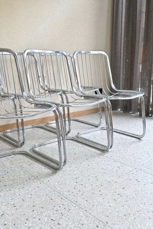 Juego de 6 sillas con estructura tubular cromada de Gastone Rinaldi