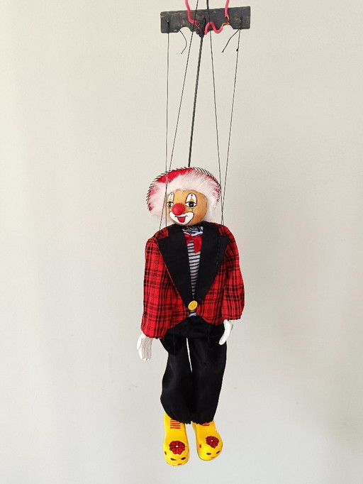 Antique clown puppet