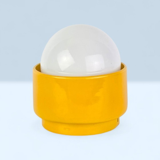 Image 1 of Vintage German ceramic lamp with a glass globe shade. Can be used as a wall lamp, table lamp, or sconce. Yellow. 70s / retro