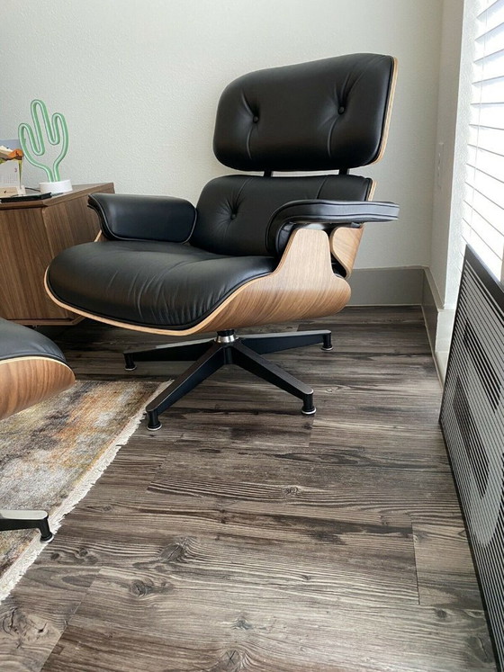 Image 1 of Poltrona e poggiapiedi Herman Miller Eames, 100% autentici.