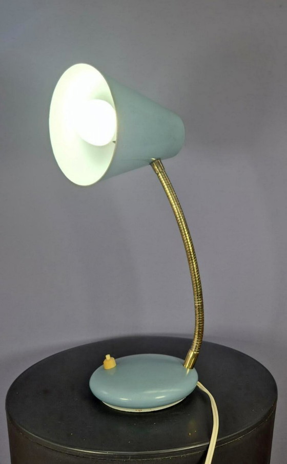 Image 1 of Massive desk lamp in light blue pastel.