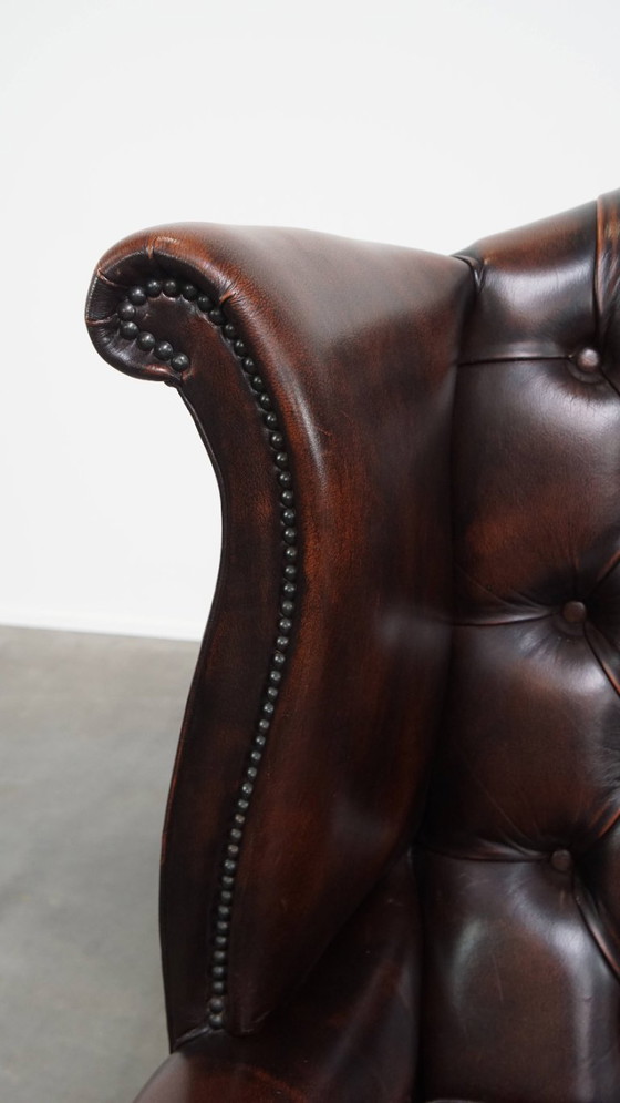 Image 1 of Bruine rundleren chesterfield oorfauteuil