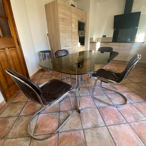 Tavolo Roche Bobois. 1970. Acciaio cromato. 175x94.