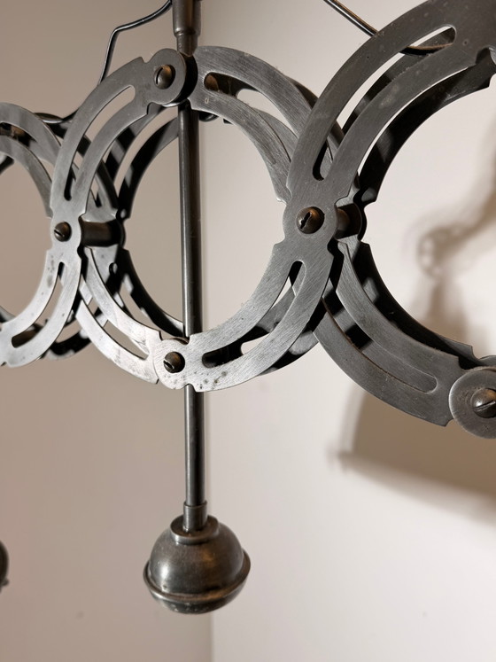 Suspension industrielle en forme de ciseaux (photo 7 of 8)