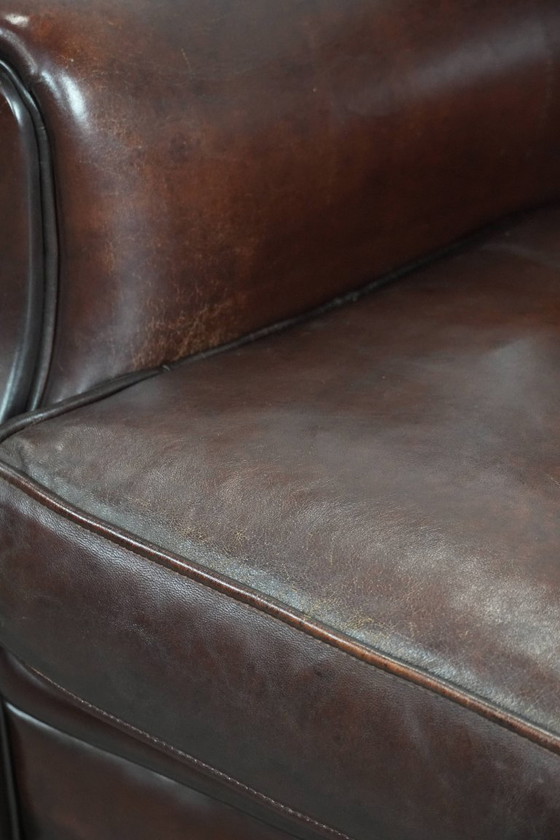 Image 1 of 2 x Schaffellsessel mit zeitlosem Look und wunderschönen dunklen Farben