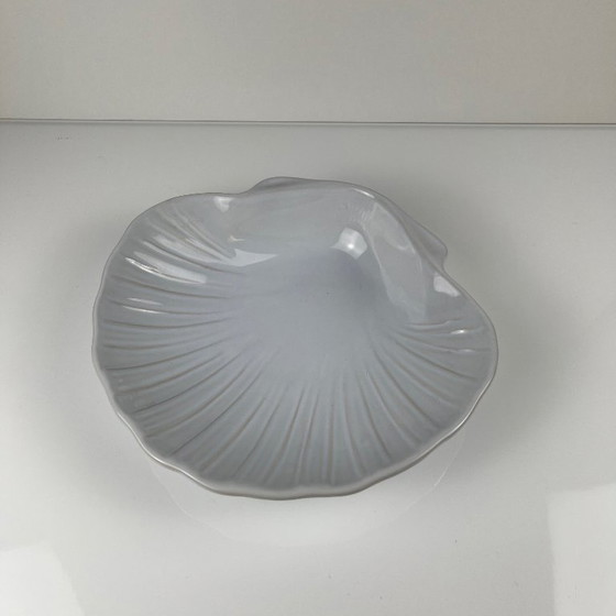 Image 1 of Large platter in the shape of a scallop shell, Emile Henry, France, mid-20th century