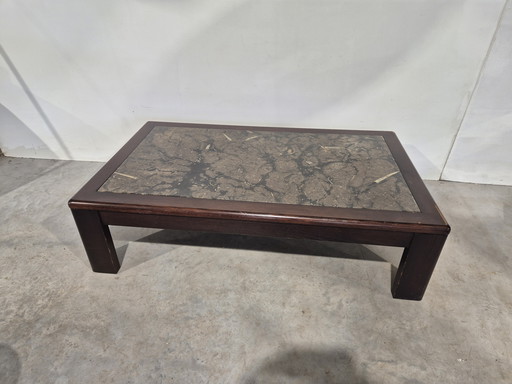 Coffee table with fossil table top
