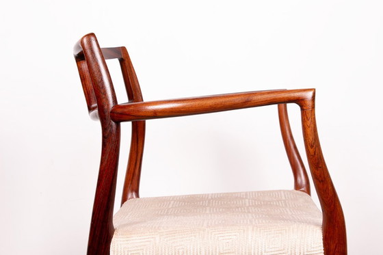 Image 1 of Fauteuil Danois en Palissandre et tissu, modèle 64 par Niels Otto Moller pour Moller’s Mobelfabrik 1960.