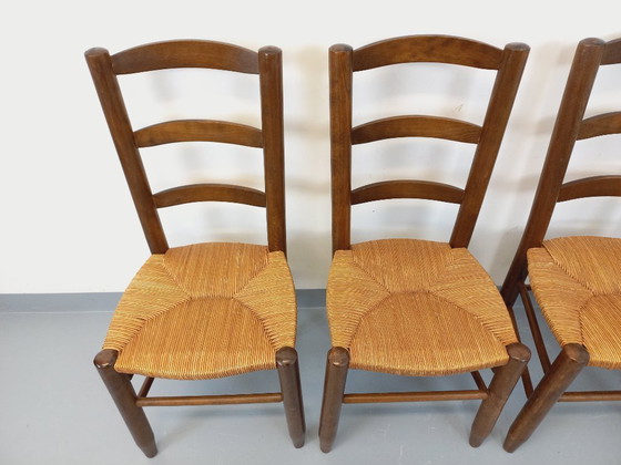 Image 1 of Set van 4 vintage brutalistische stoelen van hout en stro uit de jaren 60.