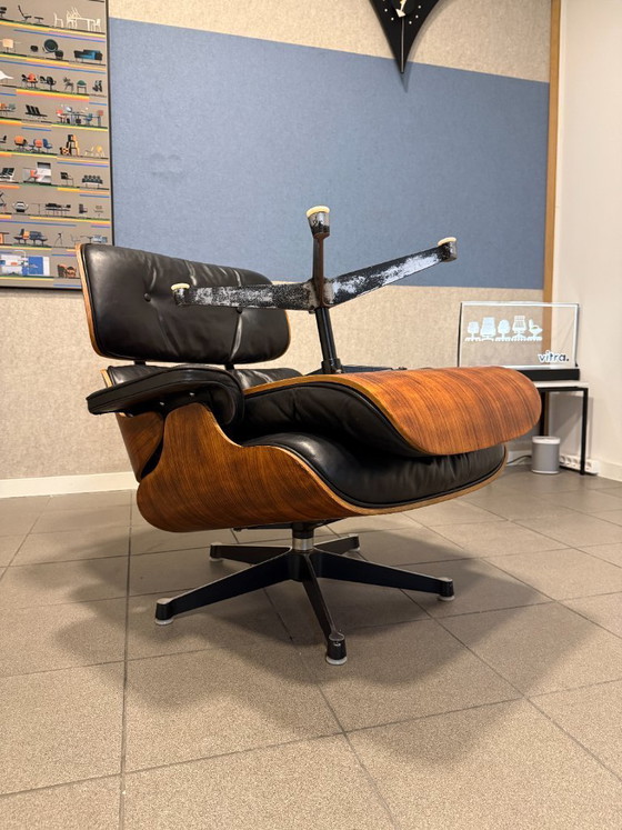 Image 1 of Herman Miller / Contura | Charles & Ray Eames | Lounge Chair & Ottoman | Rosewood & Black Leather | 1x Set