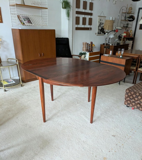Vintage rosewood round extendable dining table (photo 9 of 11)